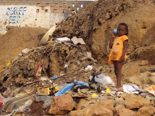 An Angolan kid over the garbage, picture taken by Jose Paulo 23 December 2009